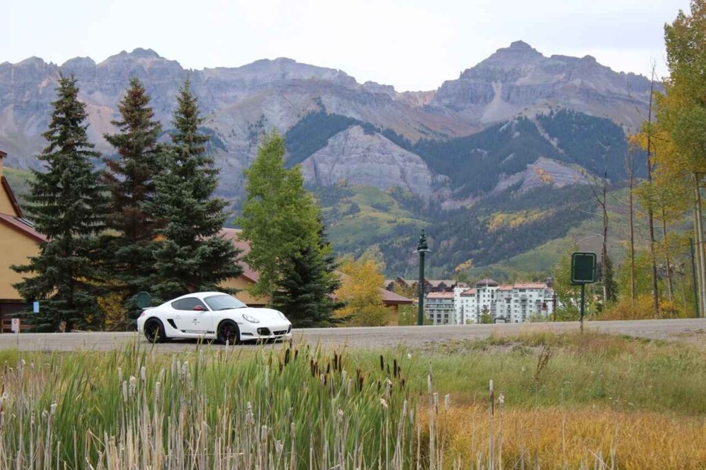 2016 Peak to Peak Rallye white car outside town